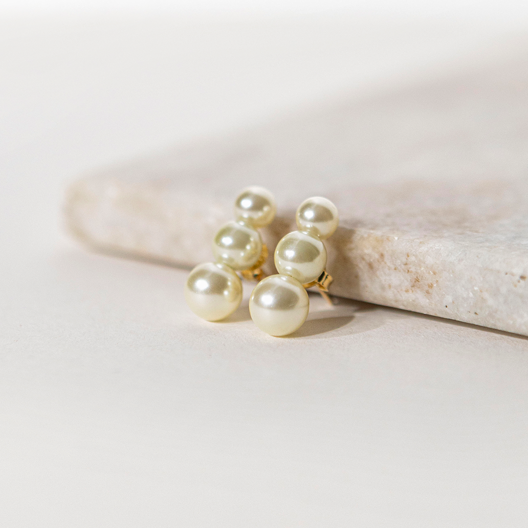 Aretes perlas corridas